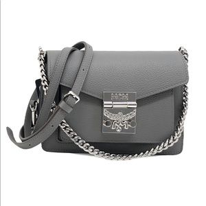gray leather bag